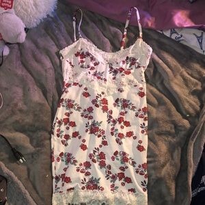 I am selling a dress with cute flowers on it. It is too big for me.